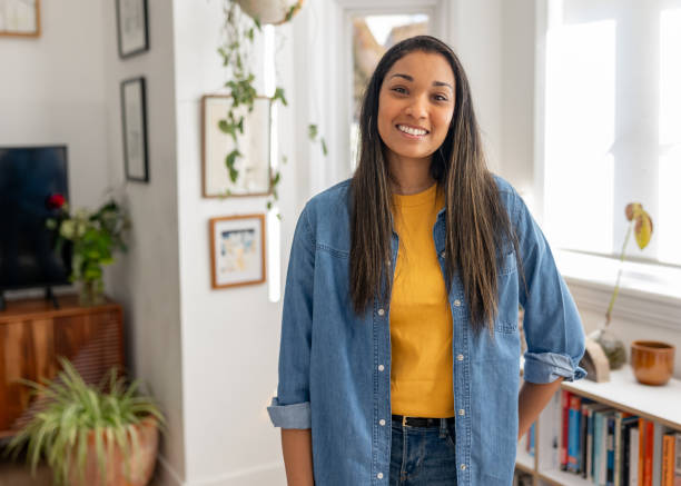 istock Happy woman smiling at home 2205618149