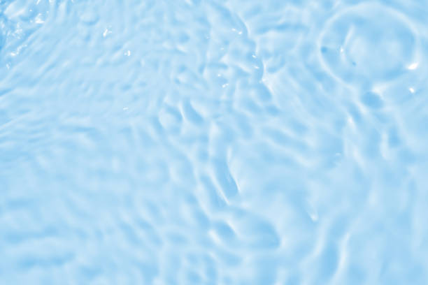 istock Abstract transparent water shadow surface texture natural ripple on blue background 2205621753