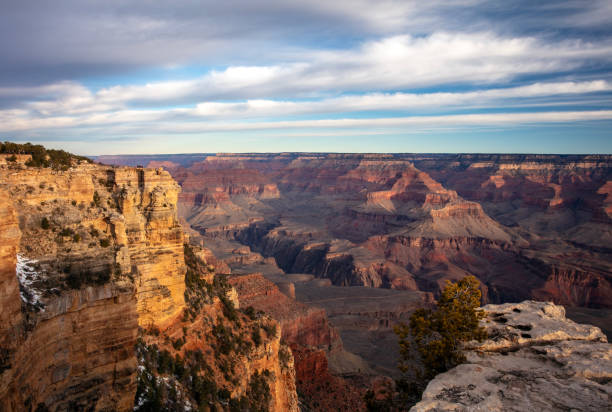 First light hits the South Rim of the Grand Canyon in late winter - Arizona, USA