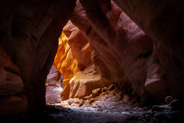 Sunlit tunnel in Buckskin Gulch slot canyon - Utah, USA