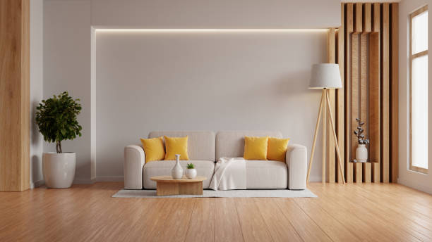 istock Modern interior living room features an sofa and decorative accessories against a white-colored wall- 3D rendering 2205626483