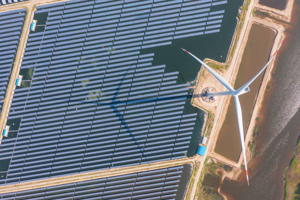 istock Alternative energy power plants, solar and wind power generation 2205634527