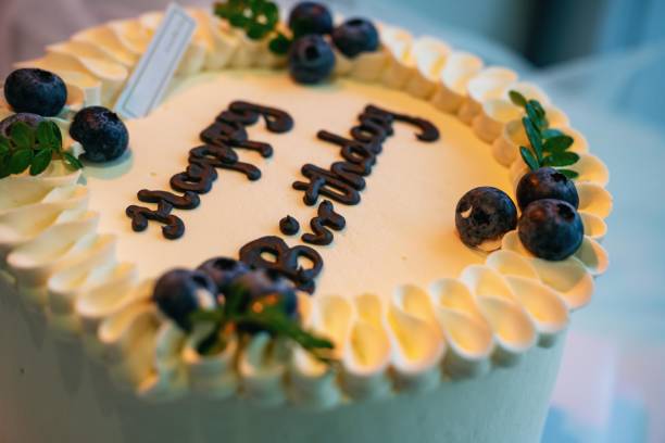 istock a cream birthday cake with blueberries 2205636039
