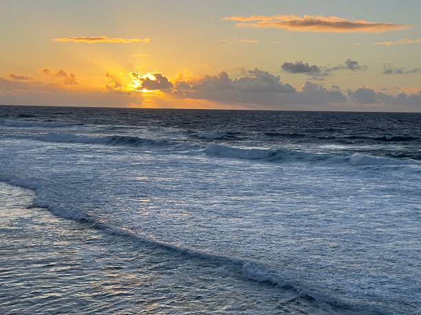 istock Sunset at La Jolla Cove with breaking Surf 2205637605