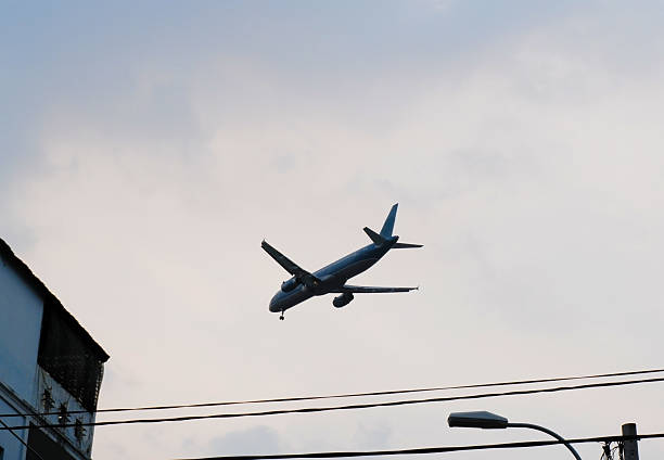 istock Airplane in the sky, view from below. 2205643172