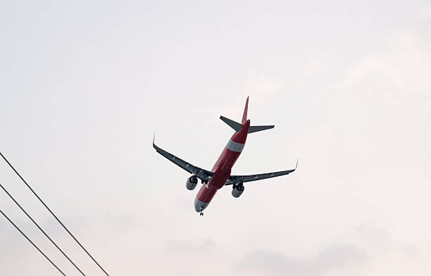 istock Airplane in the sky, view from below. 2205643189