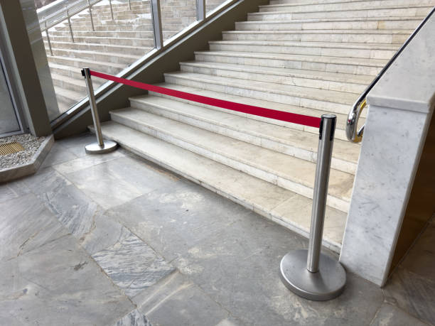 istock A red rope is on the steps of a building 2205645276