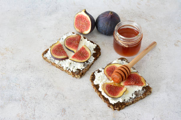 istock Figs with cream cheese, honey and toast 2205650449