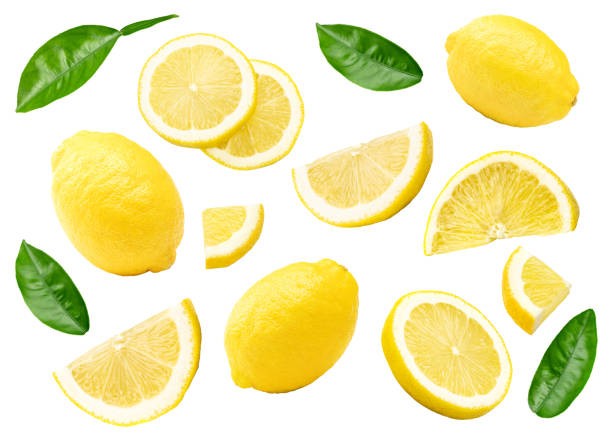 istock lemon with slice and green leaves isolated on white background. clipping path 2205653530