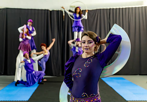istock Circus performers posing during a rehearsal in a gym 2205656231