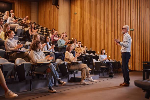 istock Applauding to our professor in lecture hall! 2205658355