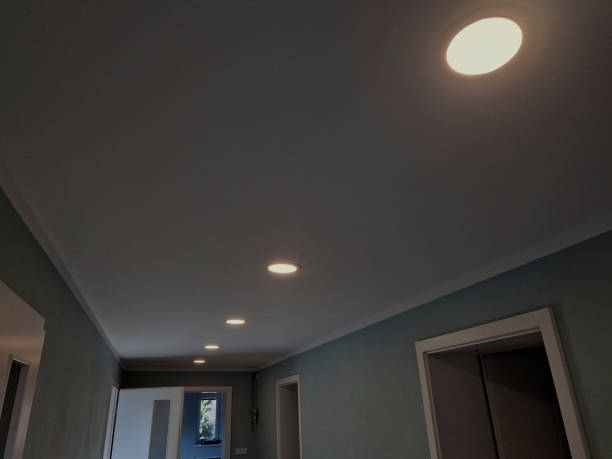 istock Plasterboard lights, even with low ceilings, and recessed plasterboard lights are space-saving. They can serve as the main lighting or as an elegant addition to a central chandelier. 2205658750