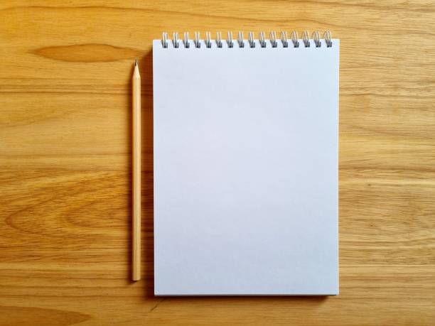 istock Spiral notebook and pencil. Close up 2205660664