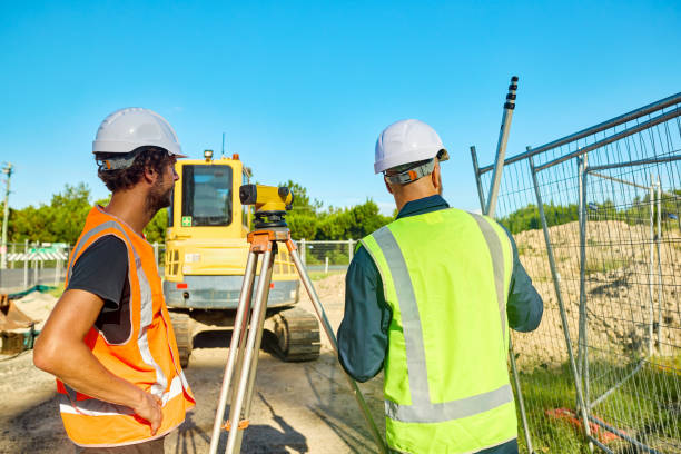 istock Engineers planning road construction using theodolite and surveying equipment 2205665807