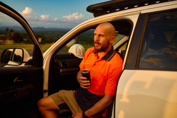 istock Australian engineer taking a break in his car during sunset 2205665833