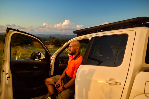 istock Australian engineer taking a break in his car during sunset 2205665842