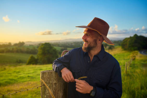 istock Australian farmer examining wheat in field at sunset 2205665845