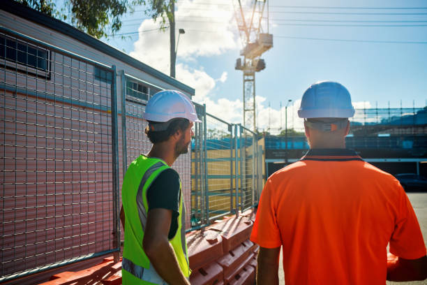 istock Australian engineers discussing plans on construction site in new south wales 2205665895