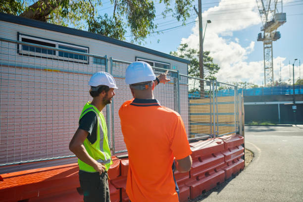istock Australian engineers discussing plans on construction site in new south wales 2205665896