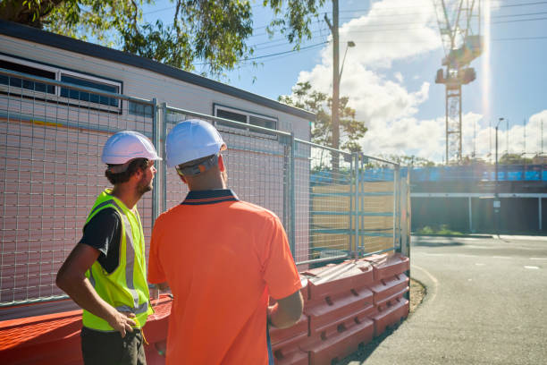 istock Australian engineers discussing plans on construction site in new south wales 2205665902