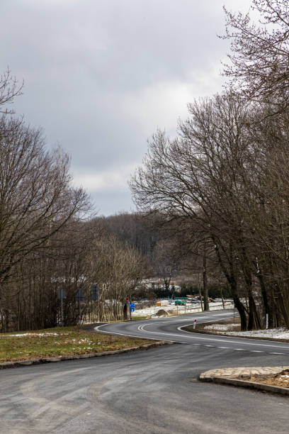 istock Asphalt road going into the distance. Poland. 2205667882