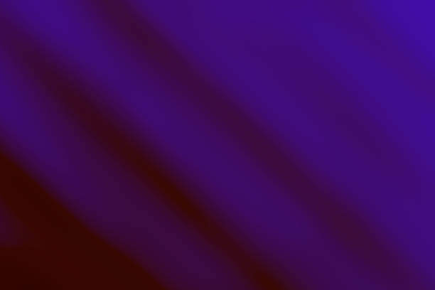 Abstract gradient background with soft purple and red hues