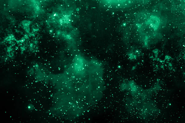 istock Abstract green glowing cosmic background with scattered particles and nebulae 2205669009