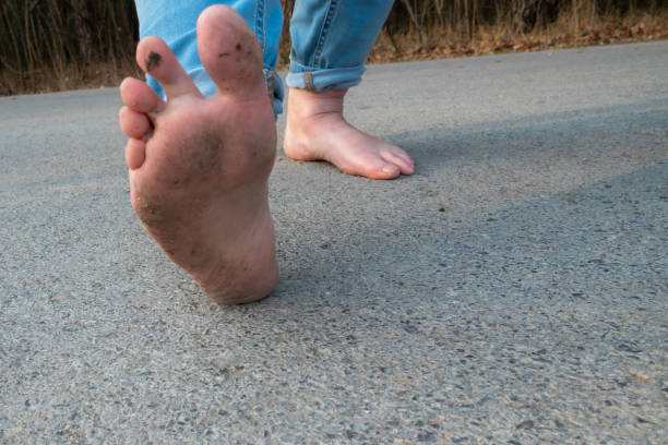 istock celebrating go barefoot day by walking without shoes 2205669426