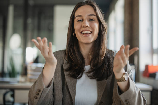 istock Cheerful woman expressing ideas in office space 2205672959