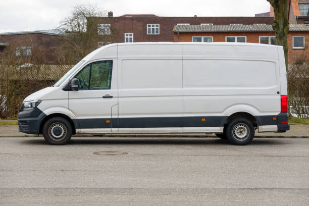 istock Parked white van with blank side, space for design, transport truck mock-up 2205674180