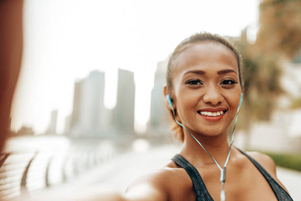 istock fitness woman take a selfie during a sport training 2205675391