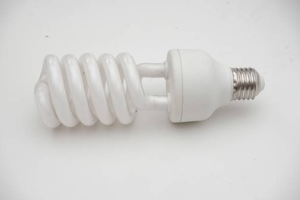 istock Compact fluorescent lamp isolated on a white background, highlighting energy-efficient lighting solutions 2205677805