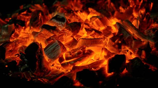 istock Close-up of Hot Embers with Flying Sparks 2205682946
