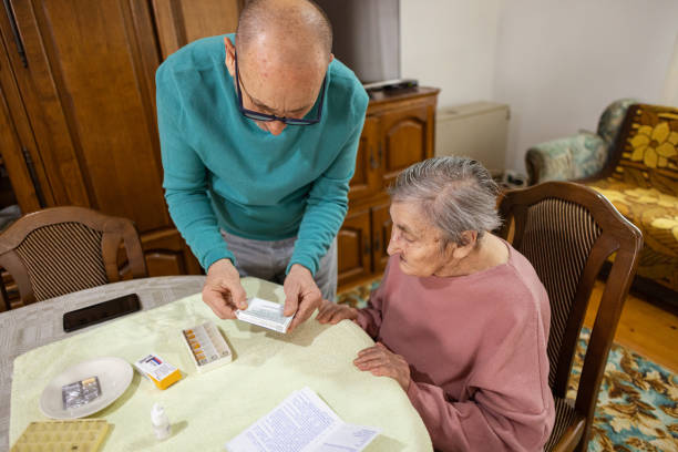 istock Helping Mom with Her Medicine 2205685344