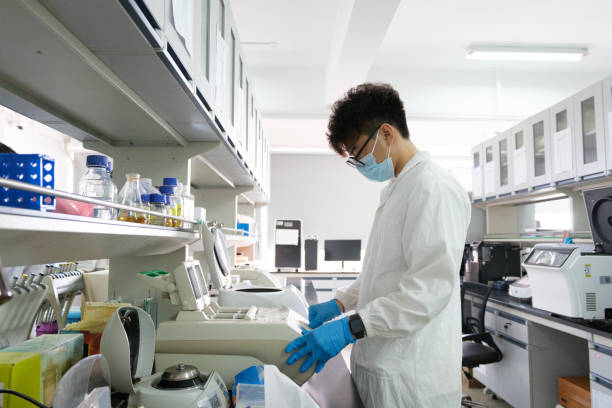 istock Asian people doing medical research in the laboratory 2205686992
