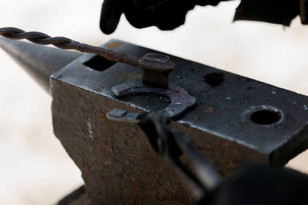 istock Stone in an anvil for horseshoes 2205687910