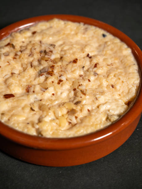 istock Delicious Indian Kheer Rice Pudding Garnished with Nuts and Spices 2205689397