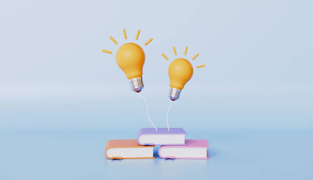 istock Reading book to get new idea, A pile of books that send light to light bulb, knowledge seeking self learning concept 2205689708