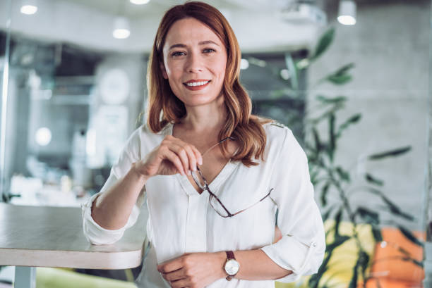 istock Confident businesswoman in modern office. 2205691875