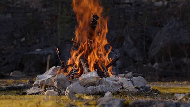 istock Crackling Campfire in a Rocky Landscape 2205695994