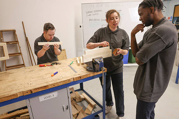 istock Disabled men and woman at workshop 2205696091