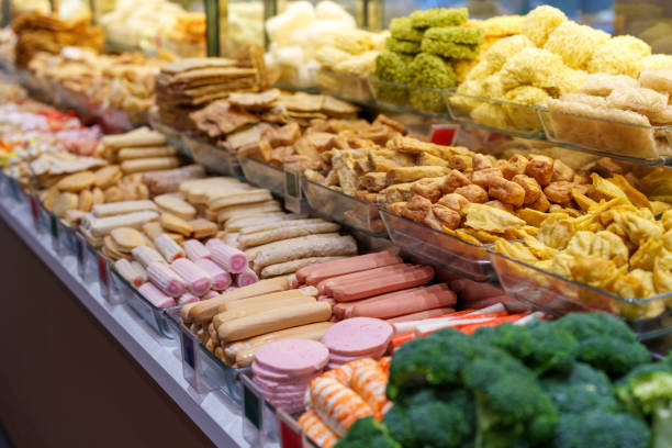 istock Assorted Dried Snacks and Fish Balls in a Food Display 2205700512