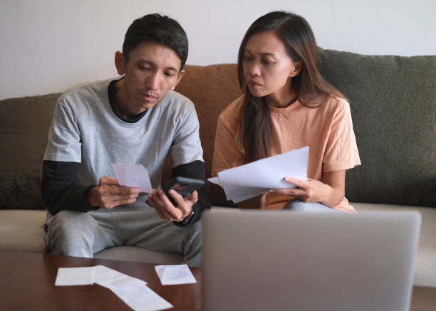 istock Indonesian Couple Struggling with Financial Issues 2205702846
