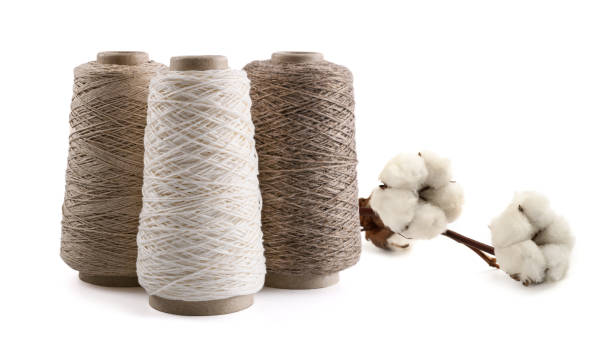 istock Bobbins of yarn and cotton 2205702900