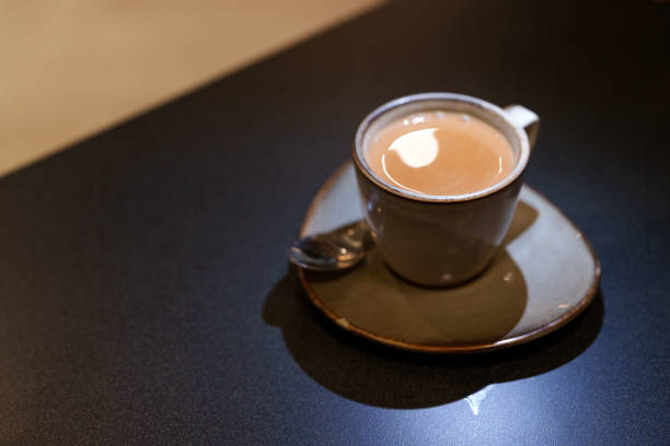 istock A warm cup of milk tea served in a ceramic cup 2205703534