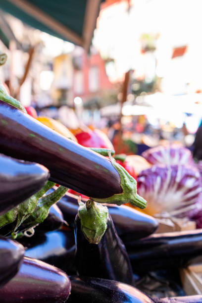 istock Fresh aubergines at the market 2205705126