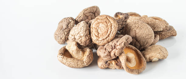 istock Dried brown shiitake mushrooms 2205705917