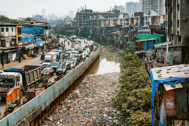 istock Urban Life Along a Congested Canal in Dharavi, Mumbai, India 2205708135