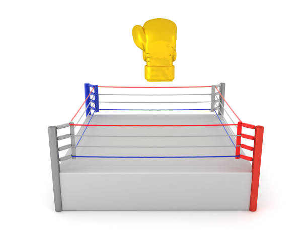 istock 3D Rendering of gold boxing glove above a ring 2205708953