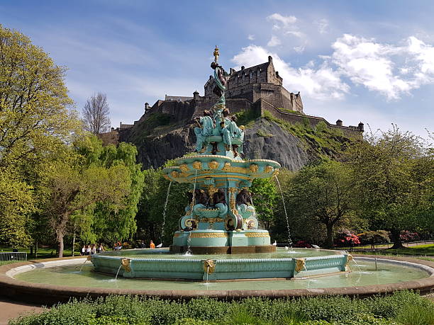 Edinburgh, Scotland, UK - May 10, 2024: View of Ross Fountain and Edinburgh Castle from Princes Street Gardens